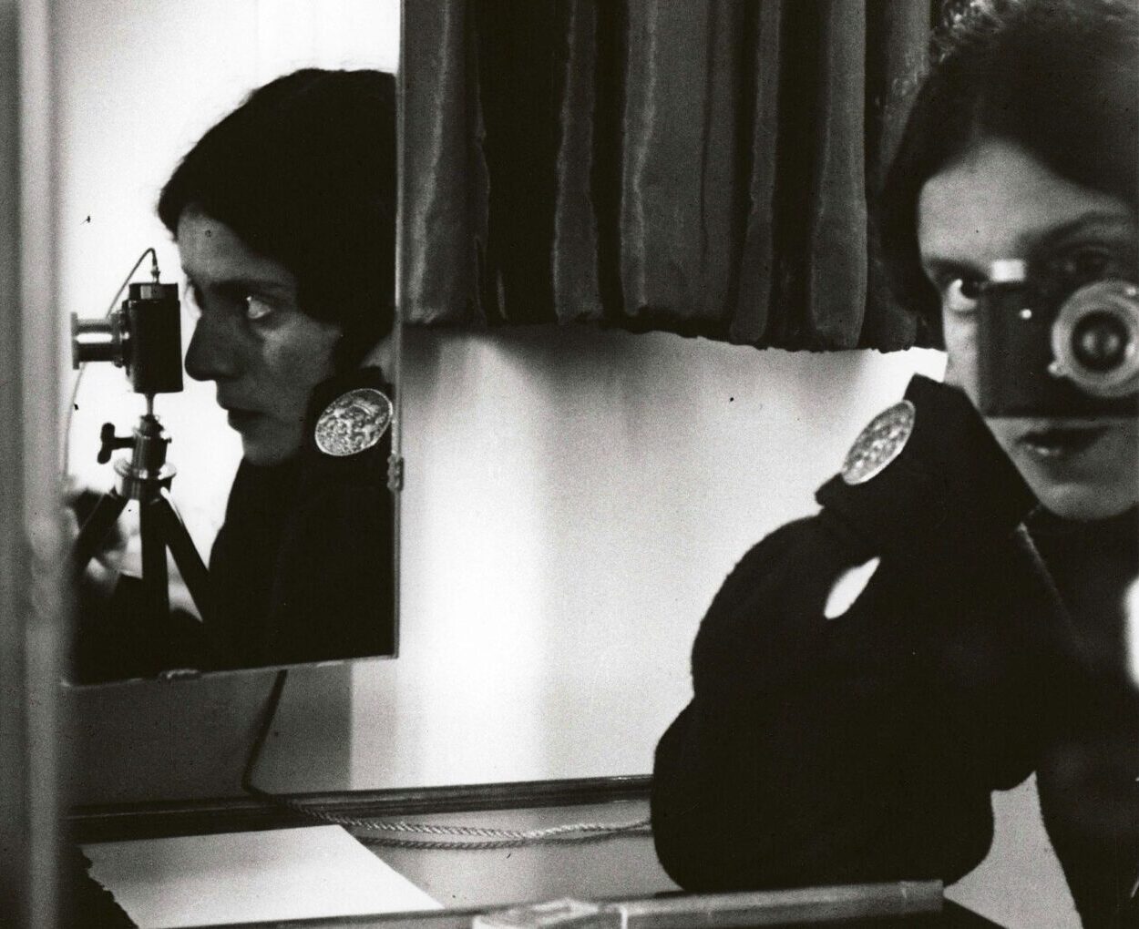 Ilse Bing, Self portrait with Leica, 1931
